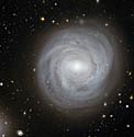 Unusual Spiral NGC 4921 in the Coma Galaxy Cluster