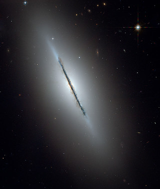 Spiral Galaxy NGC 5866 Seen Edge On - Hubble Image