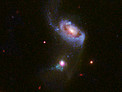 Hubble views a supermassive black hole burping — twice
