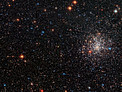 A globular cluster's striking red eye